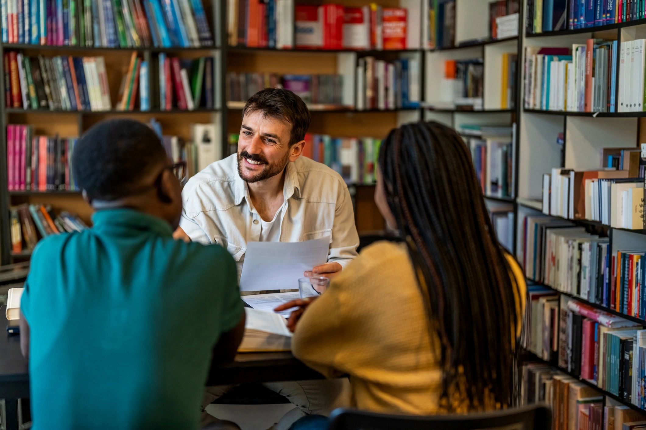 Lawyer consulting with clients during a meeting